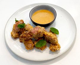 Country-Fried Strip Steak Bites with Hot Sauce White Gravy